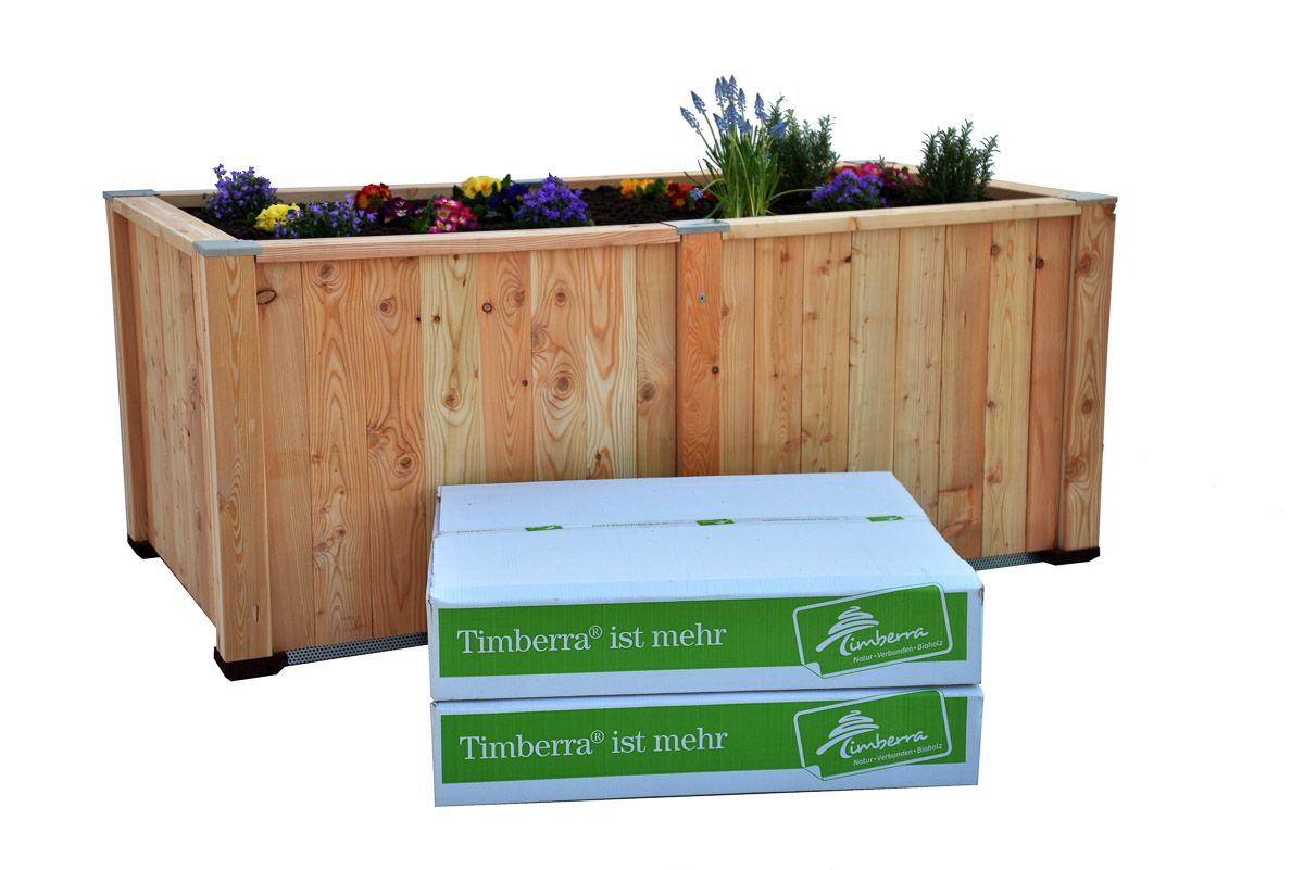 Hochbeet aufgebaut mit Befüllung, Blumen und Paket